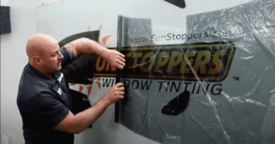 Mike Burke rolling window tint film at Sun Stoppers