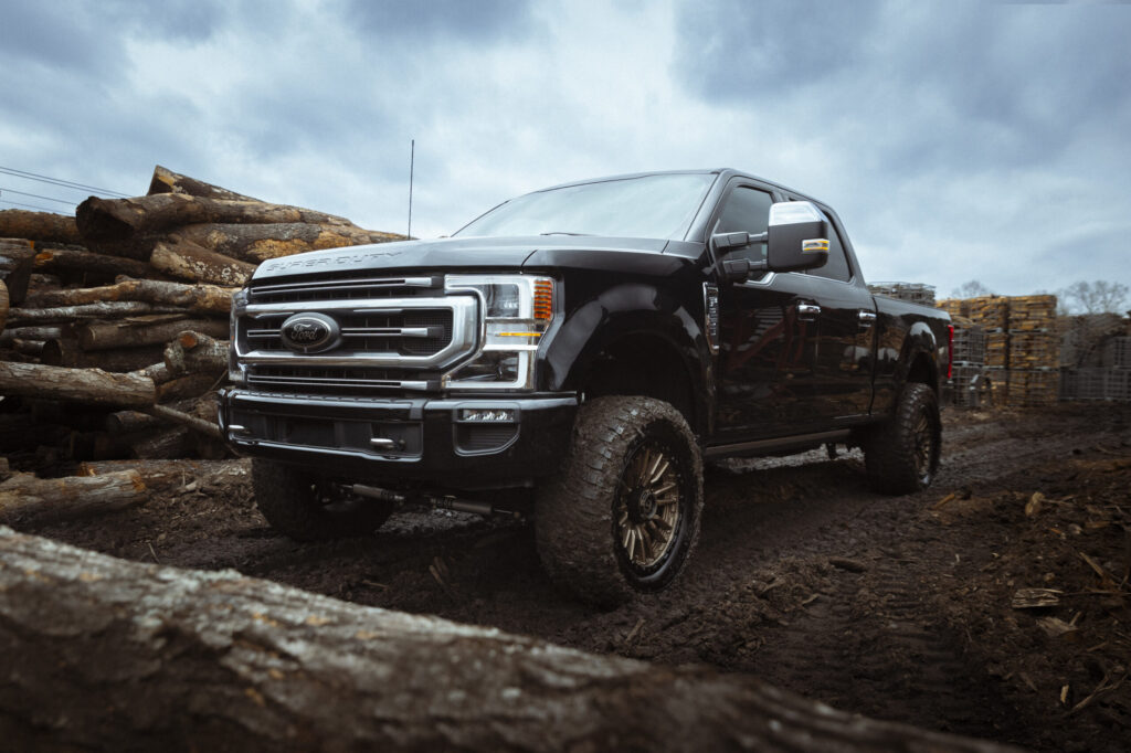 ford truck parked in the mud